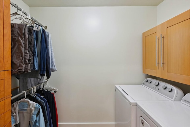 132 Azalea Ct, Sapphire, NC 28774 - laundry room featuring washing machine and clothes dryer and cabinet space