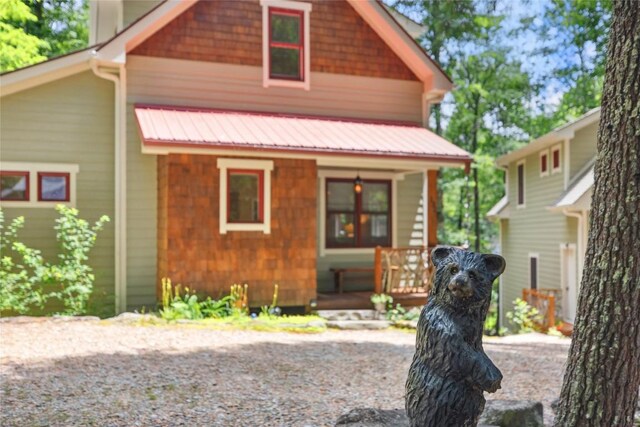 132 Azalea Ct, Sapphire, NC 28774 - view of front of home with covered porch and a metal roof