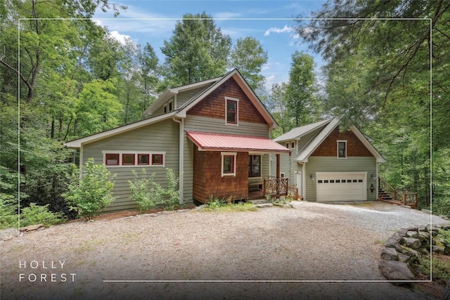 132 Azalea Ct, Sapphire, NC 28774 - view of front facade with a garage, covered porch, and stairway