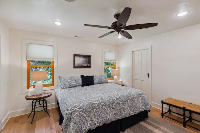 132 Azalea Ct, Sapphire, NC 28774 - bedroom with wood finished floors, recessed lighting, a ceiling fan, and a closet