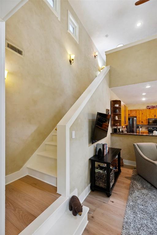 132 Azalea Ct, Sapphire, NC 28774 - staircase with wood finished floors and recessed lighting