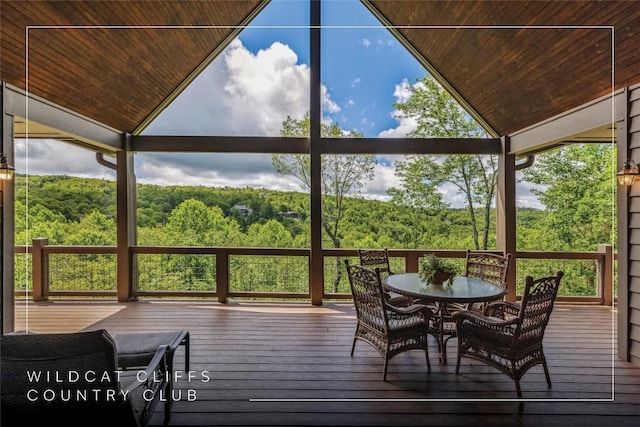 451 Country Club Dr, Highlands, NC 28741 - wooden terrace featuring a wooded view and outdoor dining area