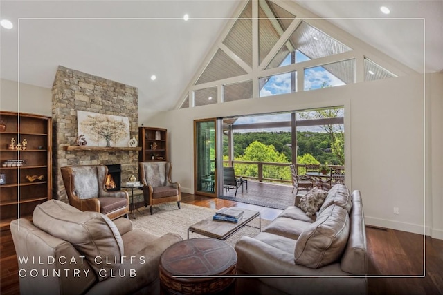 451 Country Club Dr, Highlands, NC 28741 - living area featuring high vaulted ceiling, wood finished floors, and a stone fireplace