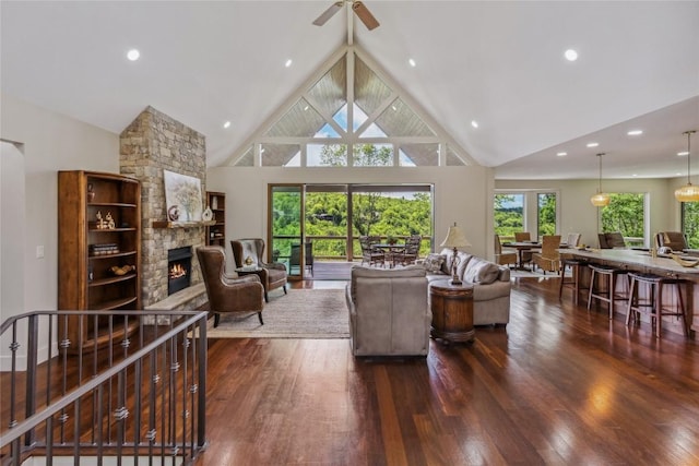 451 Country Club Dr, Highlands, NC 28741 - living area featuring wood-type flooring, high vaulted ceiling, a stone fireplace, and recessed lighting