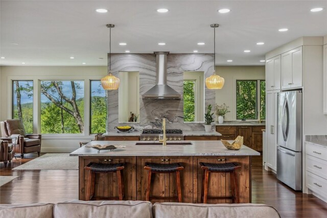 451 Country Club Dr, Highlands, NC 28741 - kitchen featuring freestanding refrigerator, wall chimney exhaust hood, dark wood-style floors, healthy amount of natural light, and recessed lighting