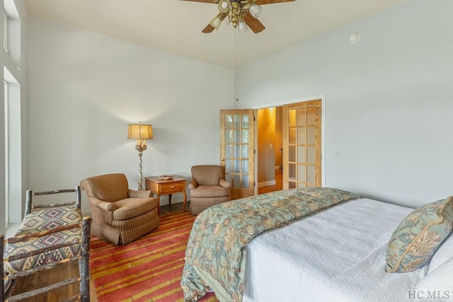 bedroom with ceiling fan and french doors