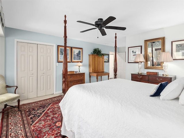 bedroom with carpet flooring, a closet, baseboards, and ceiling fan