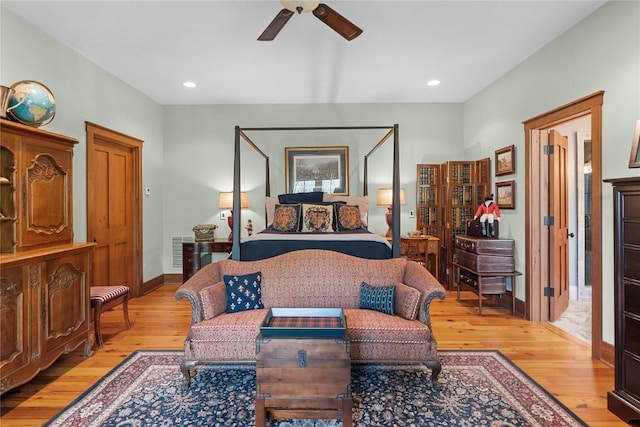 bedroom with light wood-style floors, recessed lighting, baseboards, and ceiling fan