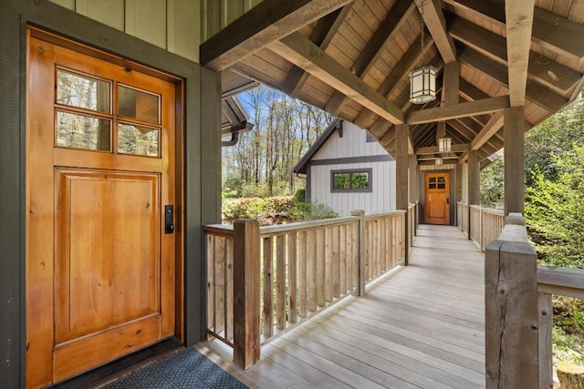 entrance to property featuring board and batten siding