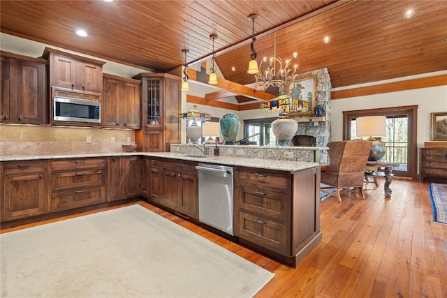 kitchen featuring appliances with stainless steel finishes, wood ceiling, a peninsula, a chandelier, and glass insert cabinets