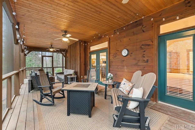 sunroom / solarium with french doors and wooden ceiling