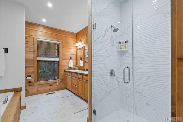 bathroom with vanity, plus walk in shower, and wood walls