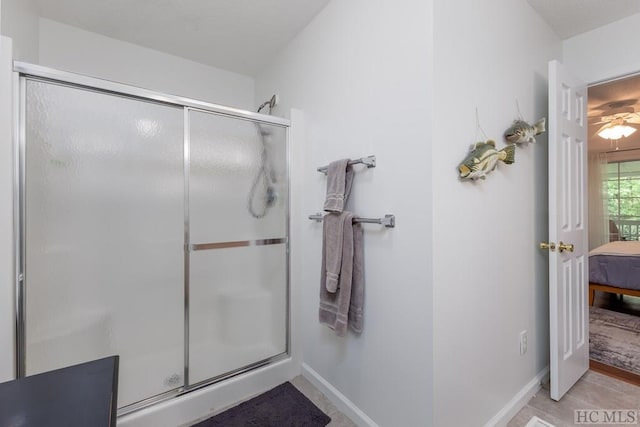 bathroom featuring tile patterned floors and walk in shower