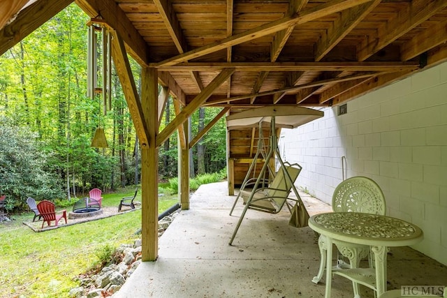 view of patio / terrace featuring a fire pit