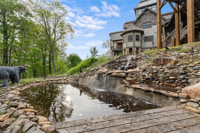 view of property's community featuring stairway