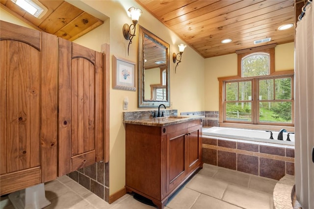 full bathroom with wooden ceiling, a garden tub, vanity, tile patterned floors, and recessed lighting