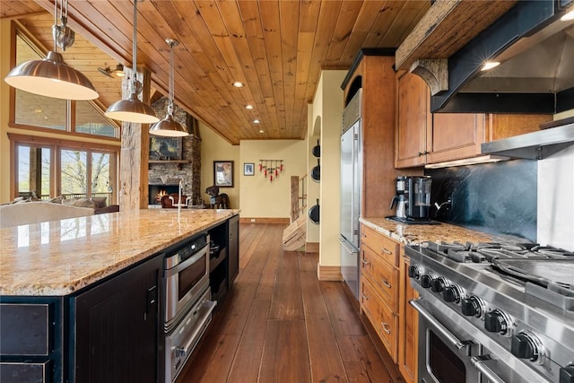 kitchen featuring wood ceiling, a warming drawer, open floor plan, baseboards, and dark wood-type flooring
