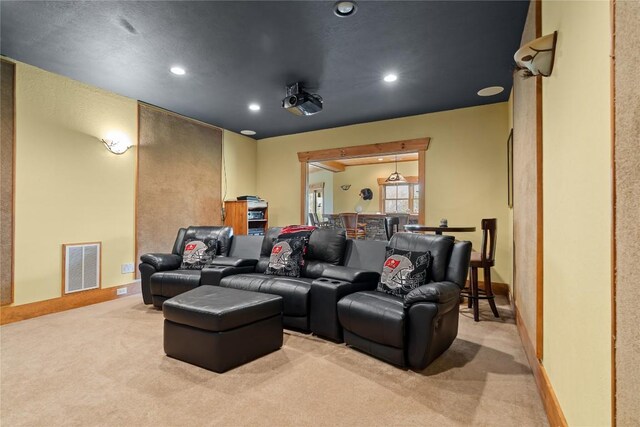 cinema room with carpet flooring, recessed lighting, and baseboards