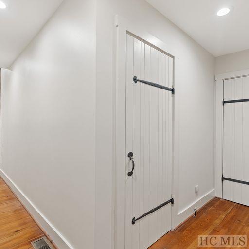 interior space with hardwood / wood-style floors