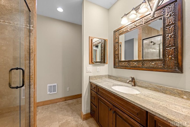 bathroom featuring vanity and walk in shower