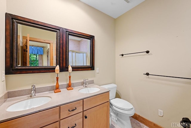 bathroom with vanity, a shower with curtain, tile patterned floors, and toilet