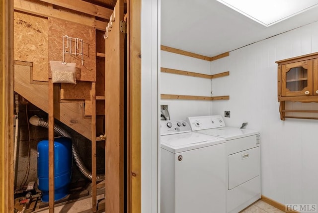 laundry area with separate washer and dryer