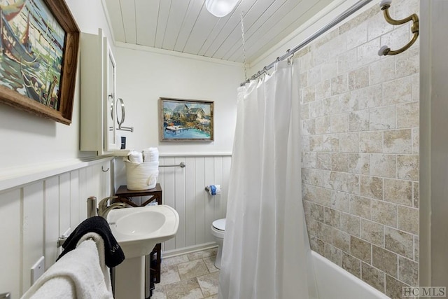 bathroom with toilet, wood ceiling, and shower / bath combination with curtain