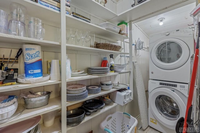 washroom with stacked washer and dryer