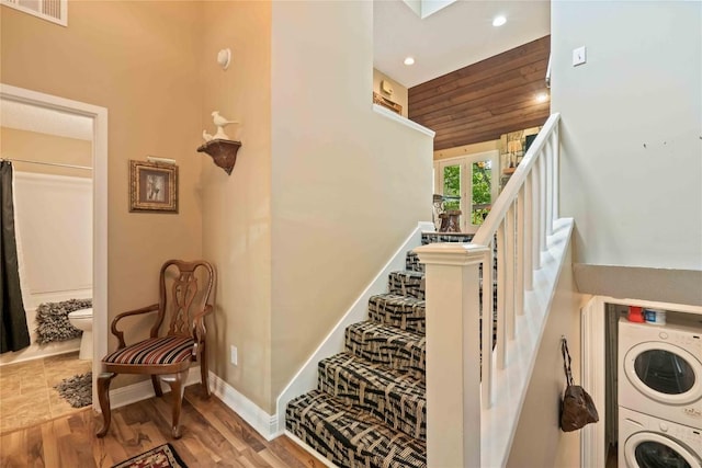 369 Meadow Way Unit 1713, Sapphire, NC 28774 - stairway with stacked washer and clothes dryer, wood finished floors, recessed lighting, vaulted ceiling, and wood ceiling