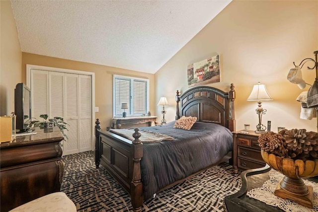 369 Meadow Way Unit 1713, Sapphire, NC 28774 - bedroom with carpet floors, vaulted ceiling, a closet, and a textured ceiling