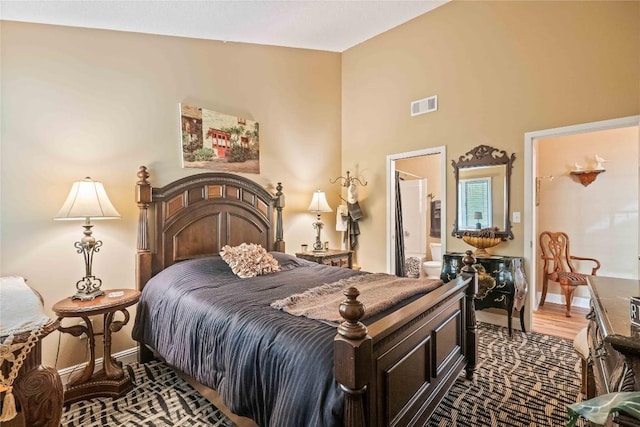 369 Meadow Way Unit 1713, Sapphire, NC 28774 - bedroom featuring connected bathroom and baseboards