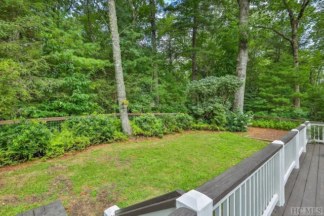 view of yard with a wooden deck