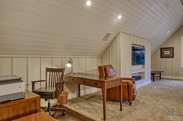 interior space with light colored carpet and lofted ceiling