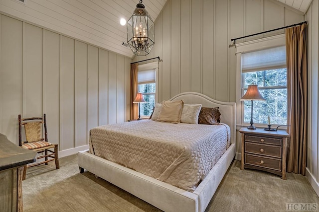 carpeted bedroom featuring wooden ceiling, vaulted ceiling, multiple windows, and a notable chandelier