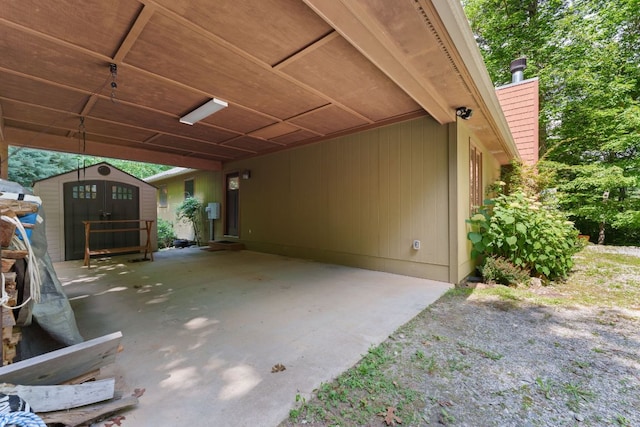 293 Gem Creek Rd, Cullowhee, NC 28723 - view of car parking featuring a storage shed and an attached carport