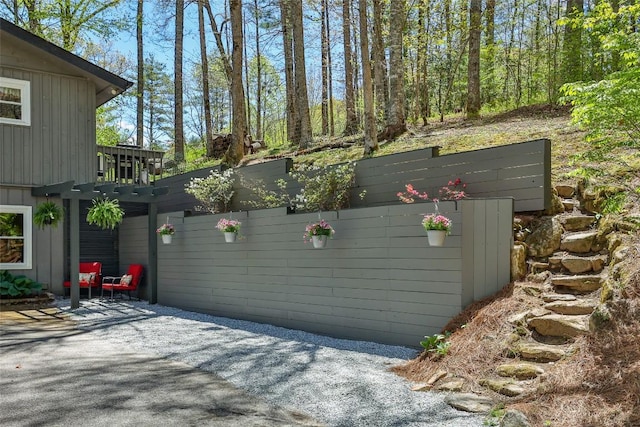 view of side of property with a patio