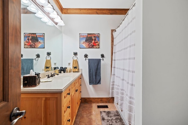 bathroom featuring a shower with curtain, tile patterned flooring, visible vents, and vanity