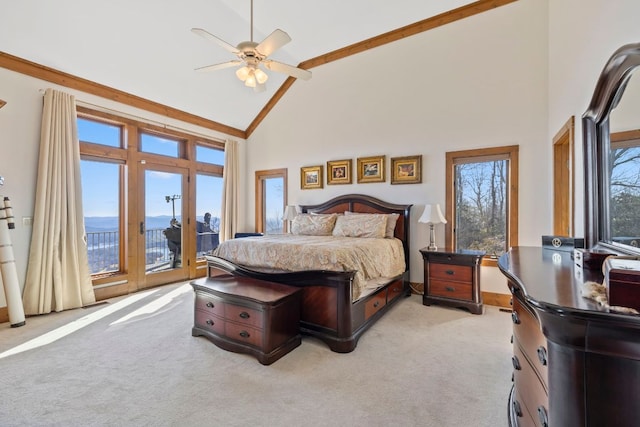 bedroom featuring high vaulted ceiling, light colored carpet, a ceiling fan, baseboards, and access to outside