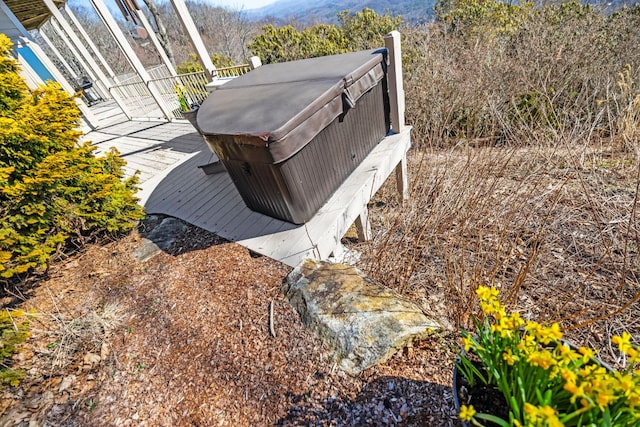 exterior details featuring a hot tub