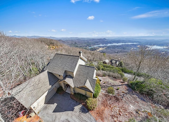 drone / aerial view featuring a mountain view