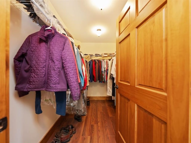219 Hiwassee Rd, Lake Toxaway, NC 28747 - walk in closet featuring dark wood finished floors