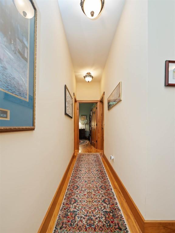 219 Hiwassee Rd, Lake Toxaway, NC 28747 - sitting room with a ceiling fan, wood finished floors, high vaulted ceiling, and an office area