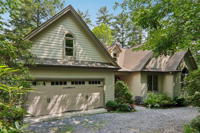 219 Hiwassee Rd, Lake Toxaway, NC 28747 - aerial view of property and surrounding area featuring a water and mountain view and property parcel outlined
