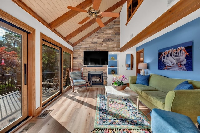 35 Toxaway Landing Dr, Lake Toxaway, NC 28747 - living area featuring wood finished floors, ceiling fan, a fireplace, a wooden ceiling with exposed beams, and high vaulted ceiling