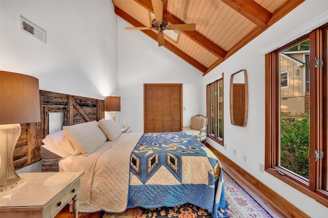 35 Toxaway Landing Dr, Lake Toxaway, NC 28747 - bedroom with wood finished floors, high vaulted ceiling, a wooden ceiling with exposed beams, and ceiling fan