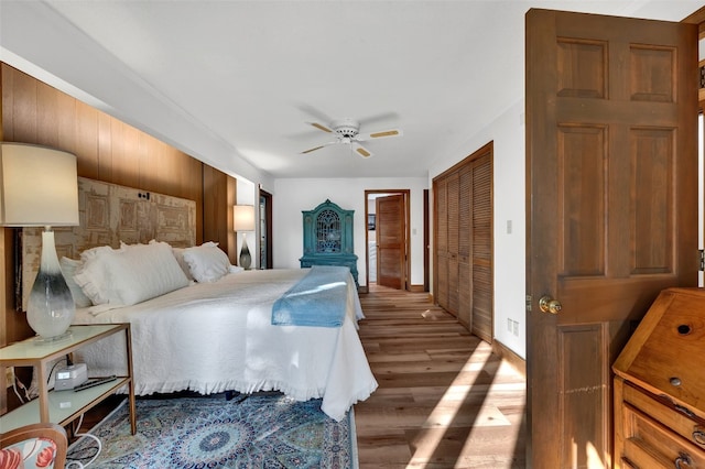 35 Toxaway Landing Dr, Lake Toxaway, NC 28747 - bedroom featuring wood finished floors, a closet, and ceiling fan