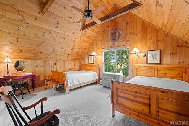 carpeted bedroom featuring vaulted ceiling with beams and wooden ceiling