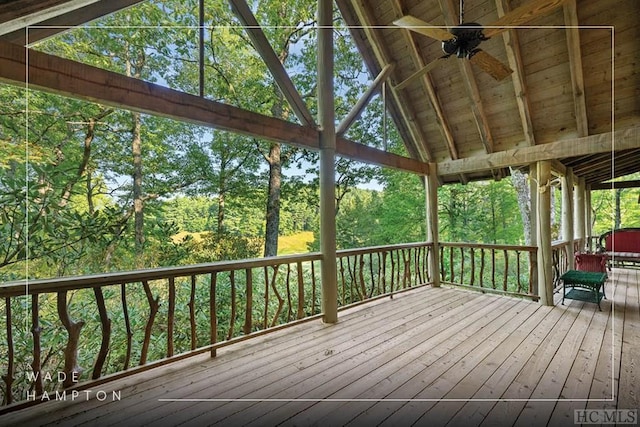 wooden terrace featuring ceiling fan