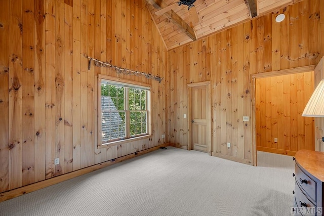 interior space featuring high vaulted ceiling, beam ceiling, wooden ceiling, and wood walls