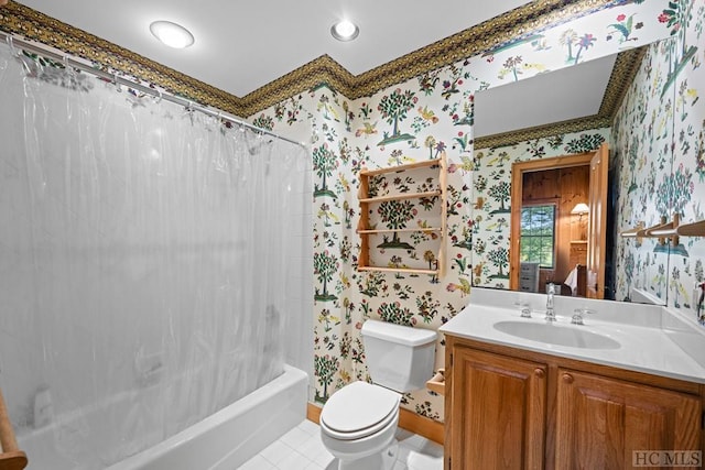 full bathroom featuring shower / tub combo with curtain, tile patterned floors, toilet, and vanity